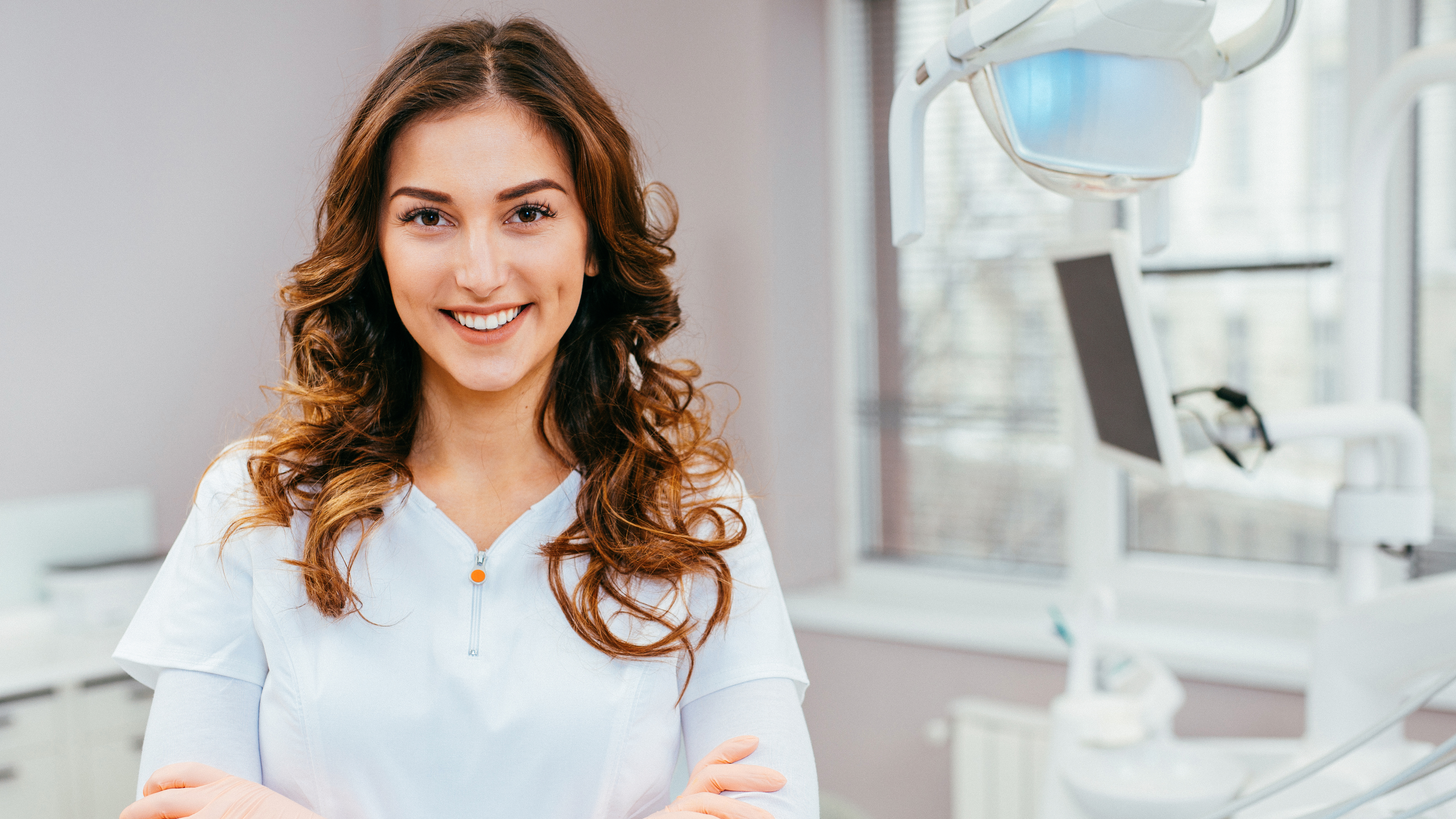 Dentist consulting with a patient in a modern dental clinic